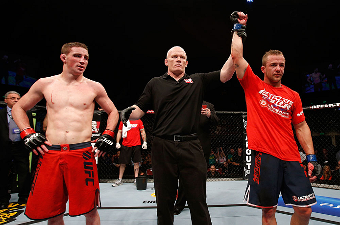 GOLD COAST, AUSTRALIA - DECEMBER 15:  Mike Wilkinson (R) reacts after defeating Brendan Loughnane during their lightweight fight at the UFC on FX event on December 15, 2012  at Gold Coast Convention and Exhibition Centre in Gold Coast, Australia.  (Photo 