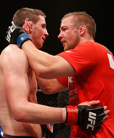 GOLD COAST, AUSTRALIA - DECEMBER 15:  (R-L) Mike Wilkinson congratulates Brendan Loughnane after their three-round lightweight fight at the UFC on FX event on December 15, 2012  at Gold Coast Convention and Exhibition Centre in Gold Coast, Australia.  (Ph