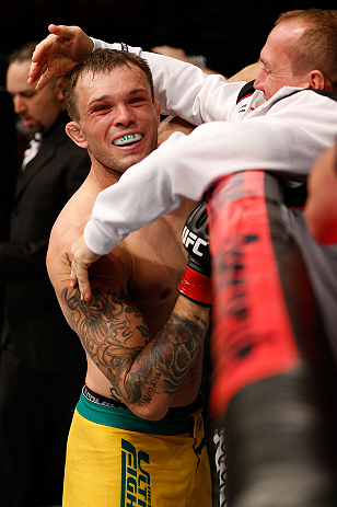 GOLD COAST, AUSTRALIA - DECEMBER 15:  Benny Alloway reacts after knocking out Manuel Rodriguez during their welterweight fight at the UFC on FX event on December 15, 2012  at Gold Coast Convention and Exhibition Centre in Gold Coast, Australia.  (Photo by