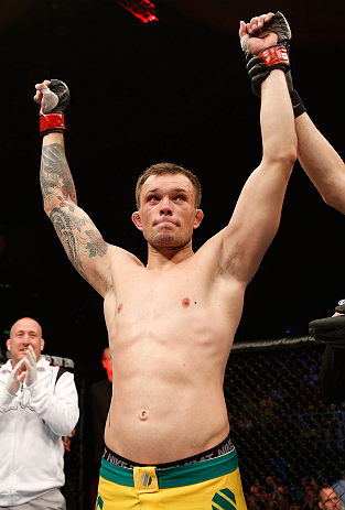 GOLD COAST, AUSTRALIA - DECEMBER 15:  Benny Alloway reacts after knocking out Manuel Rodriguez during their welterweight fight at the UFC on FX event on December 15, 2012  at Gold Coast Convention and Exhibition Centre in Gold Coast, Australia.  (Photo by