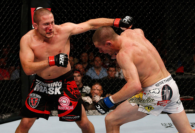 GOLD COAST, AUSTRALIA - DECEMBER 15:  (L-R) Mike Pierce punches Seth Baczynski during their welterweight fight at the UFC on FX event on December 15, 2012  at Gold Coast Convention and Exhibition Centre in Gold Coast, Australia.  (Photo by Josh Hedges/Zuf