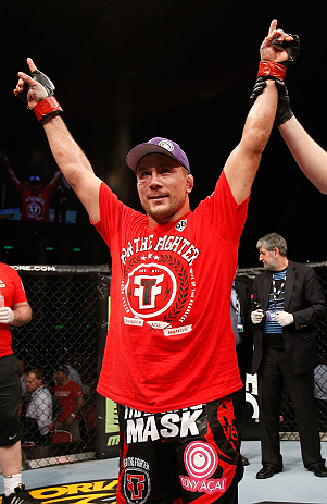 GOLD COAST, AUSTRALIA - DECEMBER 15:  Mike Pierce reacts after defeating Seth Baczynski during their welterweight fight at the UFC on FX event on December 15, 2012  at Gold Coast Convention and Exhibition Centre in Gold Coast, Australia.  (Photo by Josh H