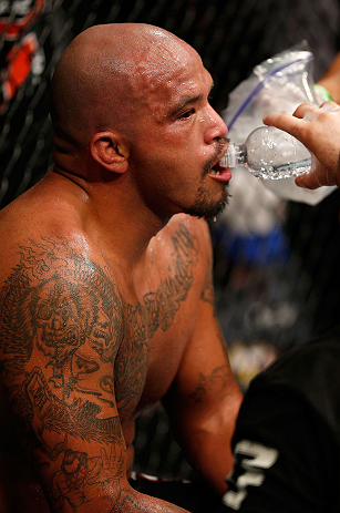 GOLD COAST, AUSTRALIA - DECEMBER 15:  Joey Beltran sits in his corner between rounds during his light heavyweight fight against Igor Pokrajac at the UFC on FX event on December 15, 2012  at Gold Coast Convention and Exhibition Centre in Gold Coast, Austra
