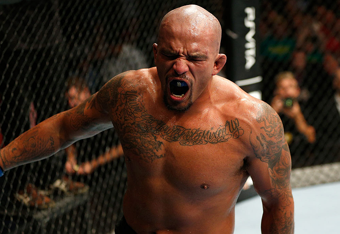 GOLD COAST, AUSTRALIA - DECEMBER 15:  Joey Beltran reacts after his light heavyweight fight against Igor Pokrajac at the UFC on FX event on December 15, 2012  at Gold Coast Convention and Exhibition Centre in Gold Coast, Australia.  (Photo by Josh Hedges/