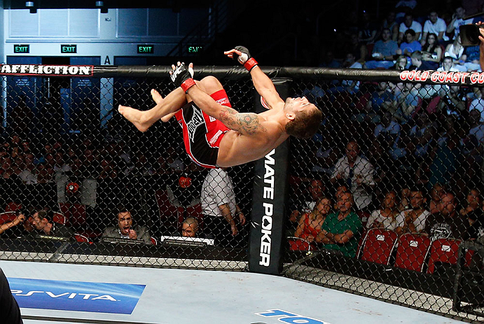 GOLD COAST, AUSTRALIA - DECEMBER 15:  Chad Mendes reacts after knocking out Yaotzin Meza during their featherweight fight at the UFC on FX event on December 15, 2012  at Gold Coast Convention and Exhibition Centre in Gold Coast, Australia.  (Photo by Josh