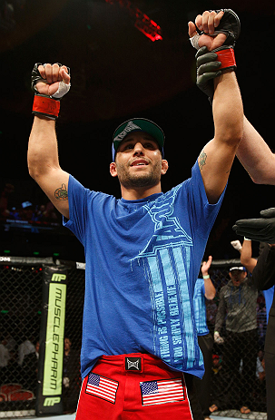 GOLD COAST, AUSTRALIA - DECEMBER 15:  Chad Mendes reacts after knocking out Yaotzin Meza during their featherweight fight at the UFC on FX event on December 15, 2012  at Gold Coast Convention and Exhibition Centre in Gold Coast, Australia.  (Photo by Josh