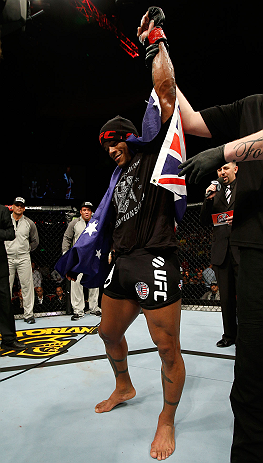 GOLD COAST, AUSTRALIA - DECEMBER 15:  Hector Lombard reacts after knocking out Rousimar Palhares during their middleweight fight at the UFC on FX event on December 15, 2012  at Gold Coast Convention and Exhibition Centre in Gold Coast, Australia.  (Photo 