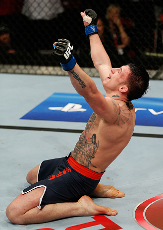 GOLD COAST, AUSTRALIA - DECEMBER 15:  Norman Parke celebrates after his lightweight fight against Colin Fletcher at the UFC on FX event on December 15, 2012  at Gold Coast Convention and Exhibition Centre in Gold Coast, Australia.  (Photo by Josh Hedges/Z