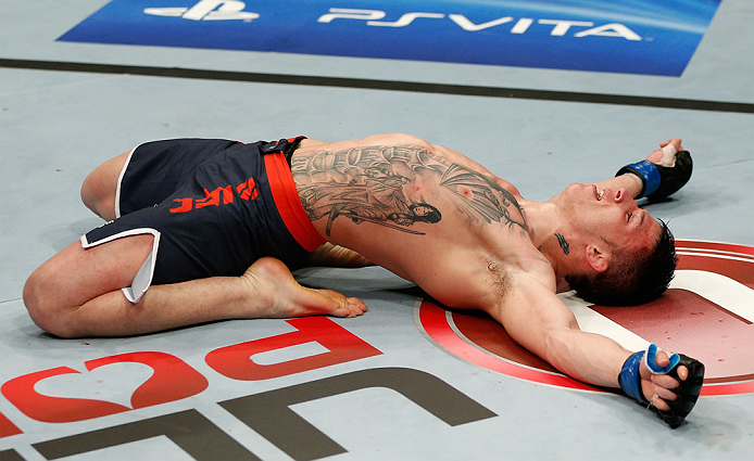 GOLD COAST, AUSTRALIA - DECEMBER 15:  Norman Parke celebrates after his lightweight fight against Colin Fletcher at the UFC on FX event on December 15, 2012  at Gold Coast Convention and Exhibition Centre in Gold Coast, Australia.  (Photo by Josh Hedges/Z