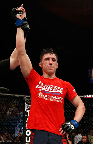 GOLD COAST, AUSTRALIA - DECEMBER 15:  Norman Parke reacts after defeating Colin Fletcher during their lightweight fight at the UFC on FX event on December 15, 2012  at Gold Coast Convention and Exhibition Centre in Gold Coast, Australia.  (Photo by Josh H