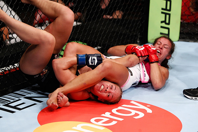 SAN DIEGO, CA - AUGUST 18: (R-L) Miesha Tate secures an arm bar submission against Julie Kedzie during the Strikeforce event at Valley View Casino Center on August 18, 2012 in San Diego, California. (Photo by Esther Lin/Forza LLC/Forza LLC via Getty Imag