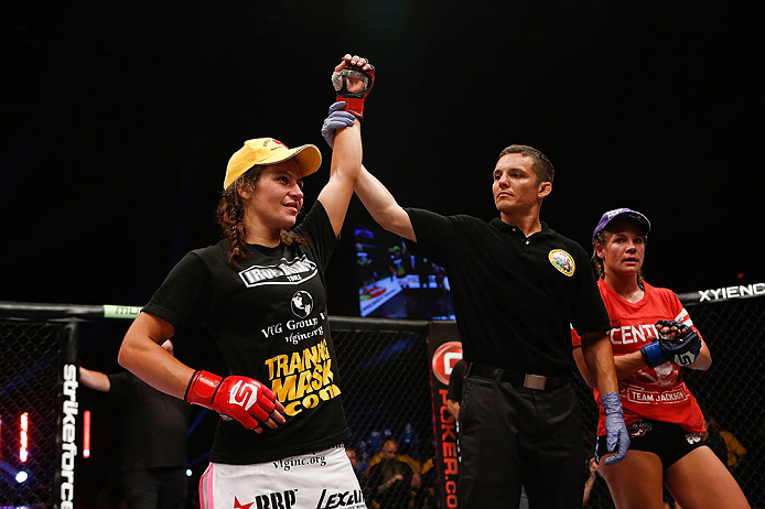 SAN DIEGO, CA - AUGUST 18: Miesha Tate (L) reacts after defeating Julie Kedzie (R) during the Strikeforce event at Valley View Casino Center on August 18, 2012 in San Diego, California. (Photo by Esther Lin/Forza LLC/Forza LLC via Getty Images)