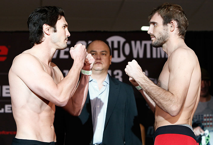 OKLAHOMA CITY, OK - JANUARY 11:  (L-R) Opponents Karl "KJ" Noons and Ryan Couture face off during the Strikeforce weigh-in event on January 11, 2013 at Chesapeake Energy Arena in Oklahoma City, Oklahoma. (Photo by Esther Lin/Forza LLC/Forza LLC via Getty 