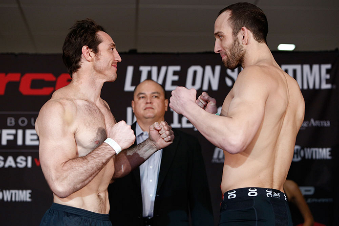 OKLAHOMA CITY, OK - JANUARY 11:  (L-R) Opponents Tim Kennedy and Trevor Smith face off during the Strikeforce weigh-in event on January 11, 2013 at Chesapeake Energy Arena in Oklahoma City, Oklahoma. (Photo by Esther Lin/Forza LLC/Forza LLC via Getty Imag