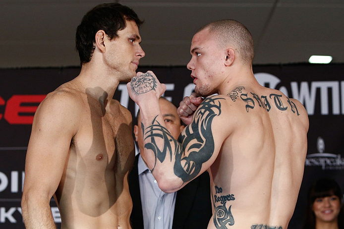 OKLAHOMA CITY, OK - JANUARY 11: (L-R) Opponents Roger Gracie and Anthony Smith face off during the Strikeforce weigh-in event on January 11, 2013 at Chesapeake Energy Arena in Oklahoma City, Oklahoma. (Photo by Esther Lin/Forza LLC/Forza LLC via Getty Im