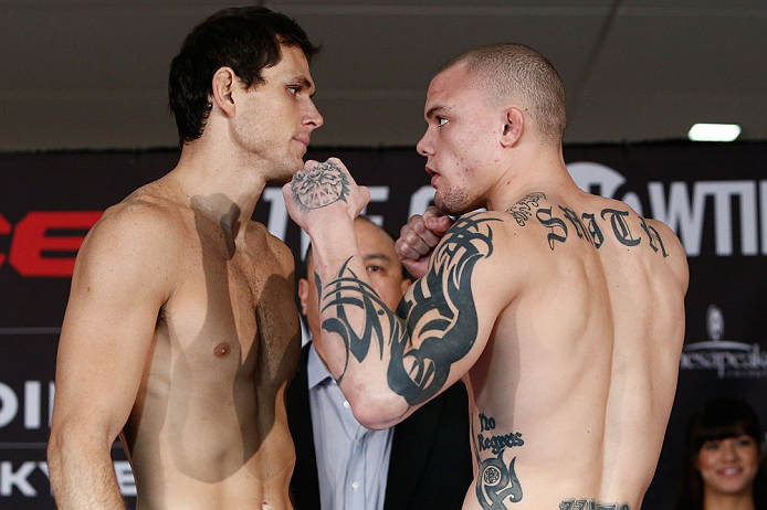 OKLAHOMA CITY, OK - JANUARY 11:  (L-R) Opponents Roger Gracie and Anthony Smith face off during the Strikeforce weigh-in event on January 11, 2013 at Chesapeake Energy Arena in Oklahoma City, Oklahoma. (Photo by Esther Lin/Forza LLC/Forza LLC via Getty Im