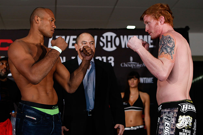 OKLAHOMA CITY, OK - JANUARY 11:  (L-R) Opponents Ronaldo "Jacare" Souza and Ed Herman face off during the Strikeforce weigh-in event on January 11, 2013 at Chesapeake Energy Arena in Oklahoma City, Oklahoma. (Photo by Esther Lin/Forza LLC/Forza LLC via Ge