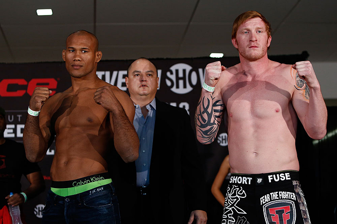 OKLAHOMA CITY, OK - JANUARY 11:  (L-R) Opponents Ronaldo "Jacare" Souza and Ed Herman pose for photos during the Strikeforce weigh-in event on January 11, 2013 at Chesapeake Energy Arena in Oklahoma City, Oklahoma. (Photo by Esther Lin/Forza LLC/Forza LLC