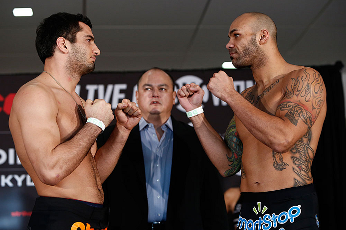 OKLAHOMA CITY, OK - JANUARY 11:  (L-R) Opponents Gegard Mousasi and Mike Kyle face off during the Strikeforce weigh-in event on January 11, 2013 at Chesapeake Energy Arena in Oklahoma City, Oklahoma. (Photo by Esther Lin/Forza LLC/Forza LLC via Getty Imag