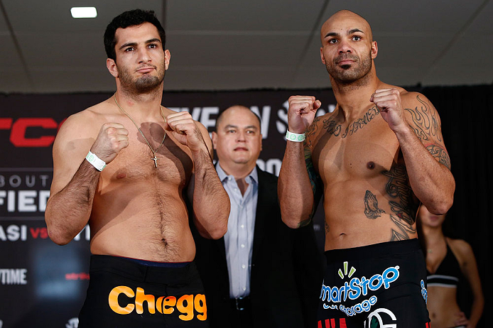 OKLAHOMA CITY, OK - JANUARY 11: (L-R) Opponents Gegard Mousasi and Mike Kyle pose for photos during the Strikeforce weigh-in event on January 11, 2013 at Chesapeake Energy Arena in Oklahoma City, Oklahoma. (Photo by Esther Lin/Forza LLC/Forza LLC via Get