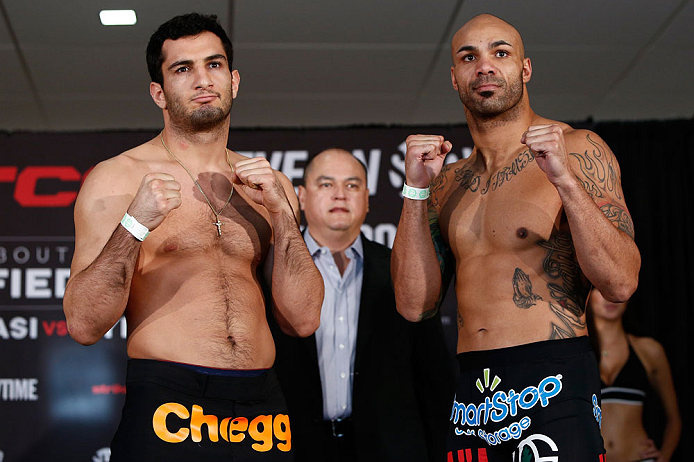 OKLAHOMA CITY, OK - JANUARY 11:  (L-R) Opponents Gegard Mousasi and Mike Kyle pose for photos during the Strikeforce weigh-in event on January 11, 2013 at Chesapeake Energy Arena in Oklahoma City, Oklahoma. (Photo by Esther Lin/Forza LLC/Forza LLC via Get