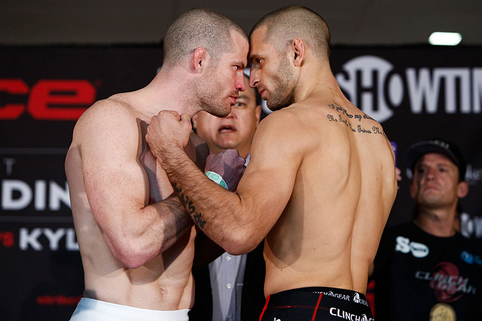 OKLAHOMA CITY, OK - JANUARY 11:  (L-R) Opponents Nate Marquardt and Tarec Saffiedine face off during the Strikeforce weigh-in event on January 11, 2013 at Chesapeake Energy Arena in Oklahoma City, Oklahoma. (Photo by Esther Lin/Forza LLC/Forza LLC via Get