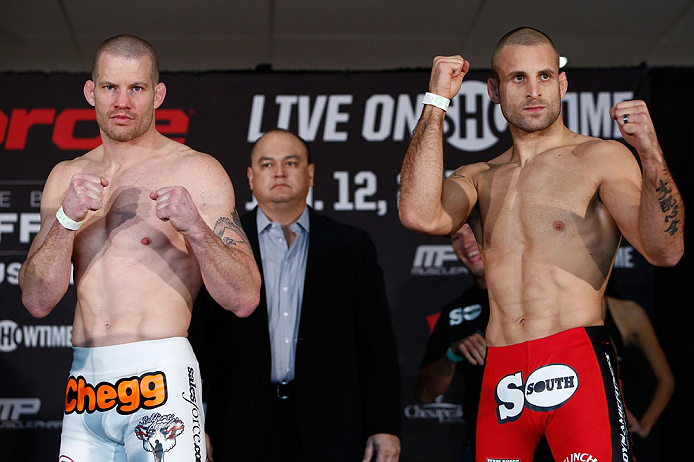 OKLAHOMA CITY, OK - JANUARY 11: (L-R) Opponents Nate Marquardt and Tarec Saffiedine pose for photos during the Strikeforce weigh-in event on January 11, 2013 at Chesapeake Energy Arena in Oklahoma City, Oklahoma. (Photo by Esther Lin/Forza LLC/Forza LLC