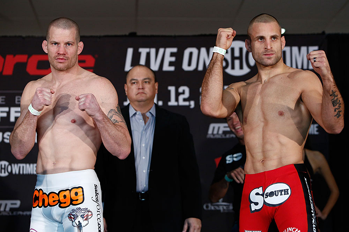 OKLAHOMA CITY, OK - JANUARY 11:  (L-R) Opponents Nate Marquardt and Tarec Saffiedine pose for photos during the Strikeforce weigh-in event on January 11, 2013 at Chesapeake Energy Arena in Oklahoma City, Oklahoma. (Photo by Esther Lin/Forza LLC/Forza LLC 