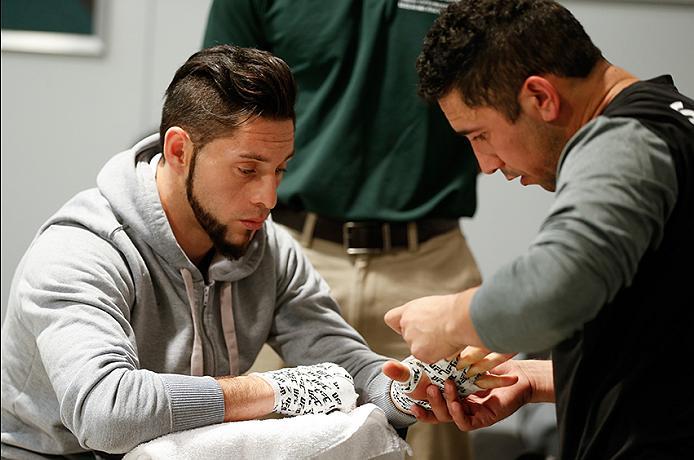 BUENOS AIRES, ARGENTINA - MAY 20: Santiago Cardenas gets his hands wrapped before facing Pablo Sabori during the filming of The Ultimate Fighter Latin America: Team Liddell vs Team Griffin on May 20, 2016 in Buenos Aires, Argentina. (Photo by Gabriel Ros