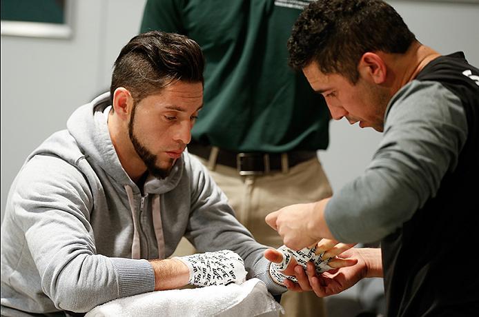 BUENOS AIRES, ARGENTINA - MAY 20:  Santiago Cardenas gets his hands wrapped before facing Pablo Sabori during the filming of The Ultimate Fighter Latin America: Team Liddell vs Team Griffin on May 20, 2016 in Buenos Aires, Argentina. (Photo by Gabriel Ros