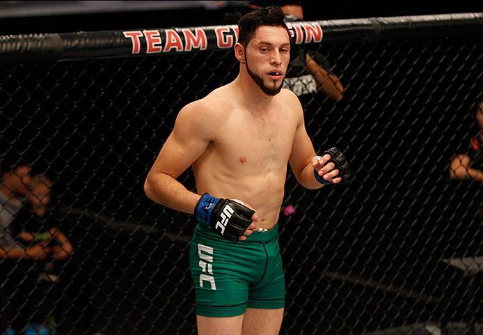 BUENOS AIRES, ARGENTINA - MAY 20:  Santiago Cardenas enters the Octagon before facing Pablo Sabori during the filming of The Ultimate Fighter Latin America: Team Liddell vs Team Griffin on May 20, 2016 in Buenos Aires, Argentina. (Photo by Gabriel Rossi/Z