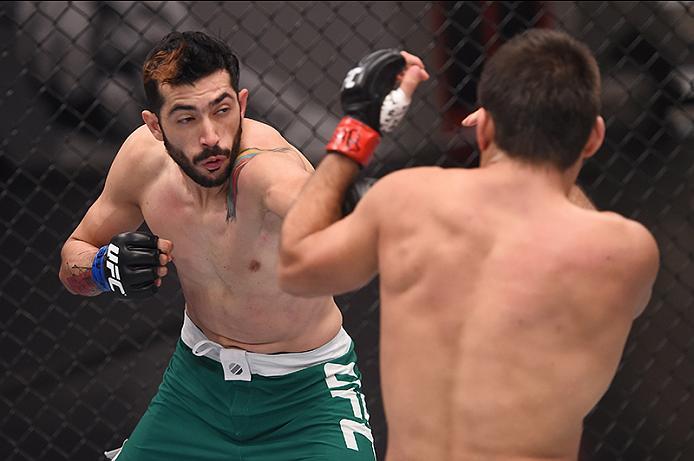 BUENOS AIRES, ARGENTINA - MAY 24: (L-R) John Bedoya punches Walter Zamora during the filming of The Ultimate Fighter Latin America: Team Liddell vs Team Griffin on May 24, 2016 in Buenos Aires, Argentina. (Photo by Amilcar Orfali/Zuffa LLC/Zuffa LLC via