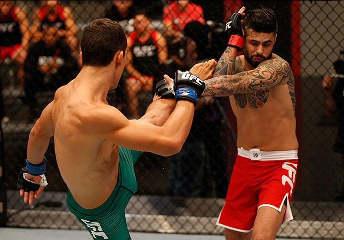 BUENOS AIRES, ARGENTINA - MAY 20: (L-R) Claudio Puelles kicks Jose David Flores during the filming of The Ultimate Fighter Latin America: Team Liddell vs Team Griffin on May 20, 2016 in Buenos Aires, Argentina. (Photo by Gabriel Rossi/Zuffa LLC/Zuffa LLC