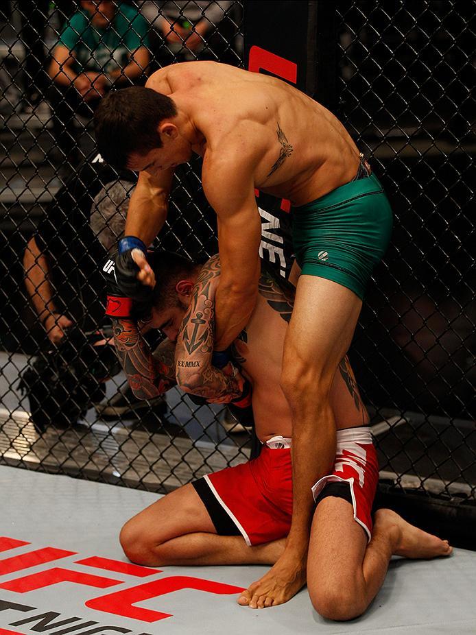 BUENOS AIRES, ARGENTINA - MAY 20: Claudio Puelles (top) punches Jose David Flores during the filming of The Ultimate Fighter Latin America: Team Liddell vs Team Griffin on May 20, 2016 in Buenos Aires, Argentina. (Photo by Gabriel Rossi/Zuffa LLC/Zuffa L