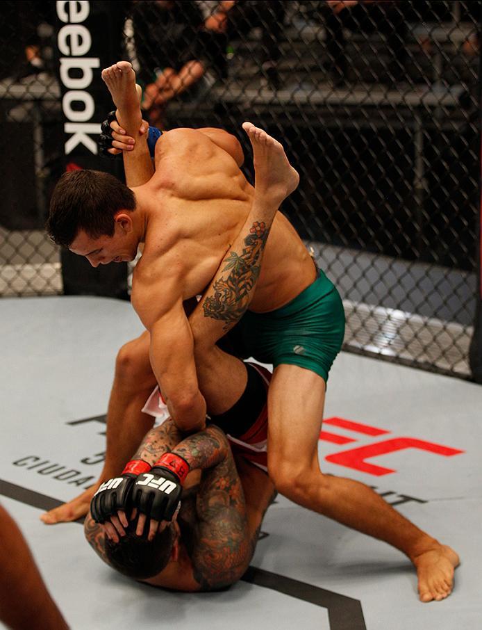 BUENOS AIRES, ARGENTINA - MAY 20: Claudio Puelles (top) punches Jose David Flores during the filming of The Ultimate Fighter Latin America: Team Liddell vs Team Griffin on May 20, 2016 in Buenos Aires, Argentina. (Photo by Gabriel Rossi/Zuffa LLC/Zuffa L