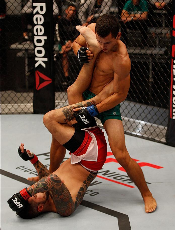 BUENOS AIRES, ARGENTINA - MAY 20: Claudio Puelles (top) punches Jose David Flores during the filming of The Ultimate Fighter Latin America: Team Liddell vs Team Griffin on May 20, 2016 in Buenos Aires, Argentina. (Photo by Gabriel Rossi/Zuffa LLC/Zuffa L