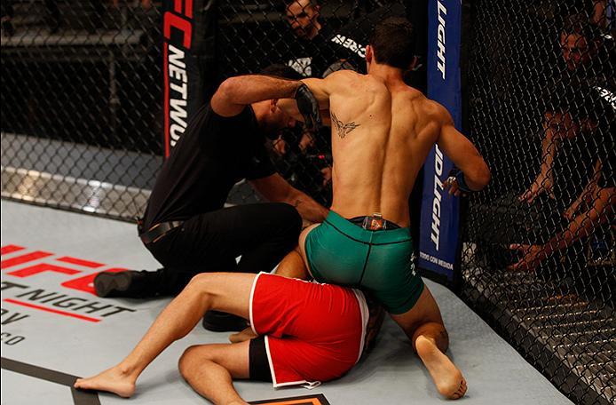 BUENOS AIRES, ARGENTINA - MAY 20: Claudio Puelles (top) punches Jose David Flores during the filming of The Ultimate Fighter Latin America: Team Liddell vs Team Griffin on May 20, 2016 in Buenos Aires, Argentina. (Photo by Gabriel Rossi/Zuffa LLC/Zuffa L