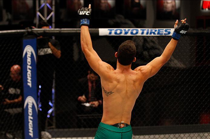 BUENOS AIRES, ARGENTINA - MAY 20: Claudio Puelles celebrates his victory over Jose David Flores during the filming of The Ultimate Fighter Latin America: Team Liddell vs Team Griffin on May 20, 2016 in Buenos Aires, Argentina. (Photo by Gabriel Rossi/Zuf