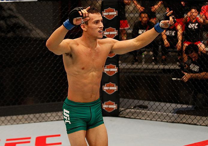 BUENOS AIRES, ARGENTINA - MAY 20: Claudio Puelles celebrates his victory over Jose David Flores during the filming of The Ultimate Fighter Latin America: Team Liddell vs Team Griffin on May 20, 2016 in Buenos Aires, Argentina. (Photo by Gabriel Rossi/Zuf