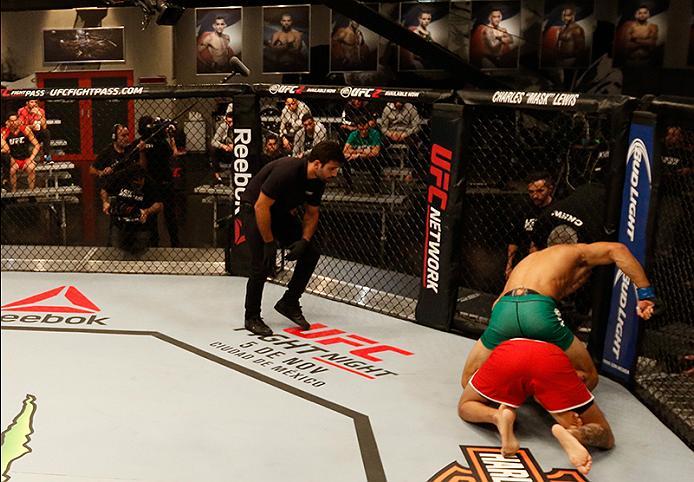 BUENOS AIRES, ARGENTINA - MAY 20: Claudio Puelles (top) punches Jose David Flores during the filming of The Ultimate Fighter Latin America: Team Liddell vs Team Griffin on May 20, 2016 in Buenos Aires, Argentina. (Photo by Gabriel Rossi/Zuffa LLC/Zuffa L