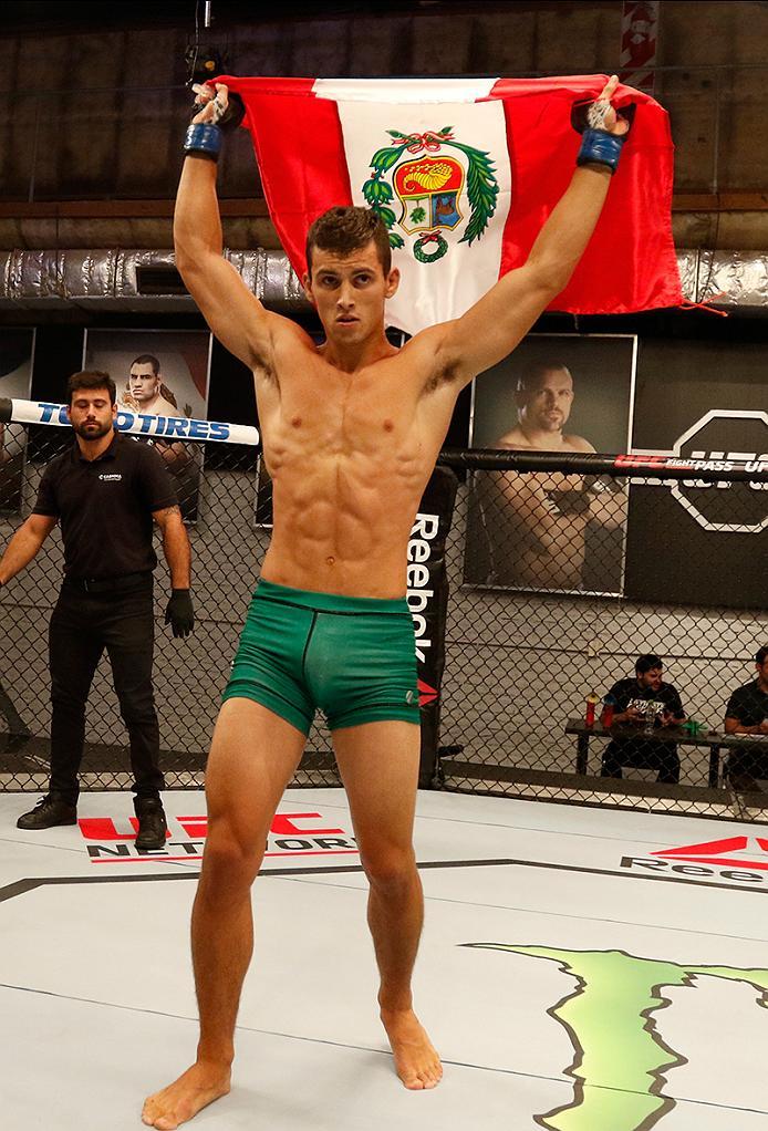 BUENOS AIRES, ARGENTINA - MAY 20: Claudio Puelles celebrates his victory over Jose David Flores during the filming of The Ultimate Fighter Latin America: Team Liddell vs Team Griffin on May 20, 2016 in Buenos Aires, Argentina. (Photo by Gabriel Rossi/Zuf