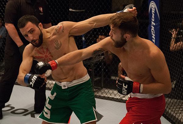 LAS VEGAS, NV - APRIL 3: (R-L) Kevin Mendinilla punches Enrique Marin during the filming of The Ultimate Fighter Latin America: Team Gastelum vs Team Escudero on April 3, 2015 in Las Vegas, Nevada. (Photo by Brandon Magnus/Zuffa LLC/Zuffa LLC via Getty