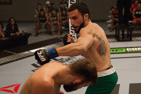 LAS VEGAS, NV - APRIL 3: (R-L) Enrique Marin punches Kevin Mendinilla during the filming of The Ultimate Fighter Latin America: Team Gastelum vs Team Escudero on April 3, 2015 in Las Vegas, Nevada. (Photo by Brandon Magnus/Zuffa LLC/Zuffa LLC via Getty
