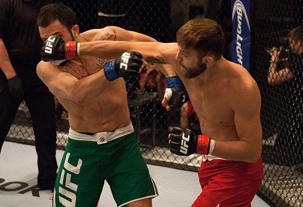 LAS VEGAS, NV - APRIL 3: (R-L) Kevin Mendinilla punches Enrique Marin during the filming of The Ultimate Fighter Latin America: Team Gastelum vs Team Escudero on April 3, 2015 in Las Vegas, Nevada. (Photo by Brandon Magnus/Zuffa LLC/Zuffa LLC via Getty