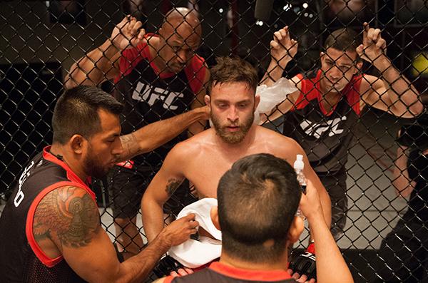 LAS VEGAS, NV - APRIL 3: Kevin Mendinilla receives advice from his corner in between rounds while facing Enrique Marin during the filming of The Ultimate Fighter Latin America: Team Gastelum vs Team Escudero on April 3, 2015 in Las Vegas, Nevada. (Photo