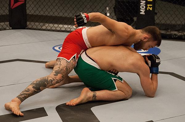 LAS VEGAS, NV - APRIL 3: Kevin Mendinilla (top) punches Enrique Marin during the filming of The Ultimate Fighter Latin America: Team Gastelum vs Team Escudero on April 3, 2015 in Las Vegas, Nevada. (Photo by Brandon Magnus/Zuffa LLC/Zuffa LLC via Getty