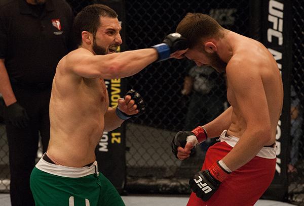LAS VEGAS, NV - APRIL 3: (L-R) Enrique Marin punches Kevin Mendinilla during the filming of The Ultimate Fighter Latin America: Team Gastelum vs Team Escudero on April 3, 2015 in Las Vegas, Nevada. (Photo by Brandon Magnus/Zuffa LLC/Zuffa LLC via Getty