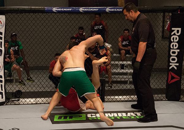 LAS VEGAS, NV - APRIL 3: Enrique Marin (top) punches Kevin Mendinilla during the filming of The Ultimate Fighter Latin America: Team Gastelum vs Team Escudero on April 3, 2015 in Las Vegas, Nevada. (Photo by Brandon Magnus/Zuffa LLC/Zuffa LLC via Getty