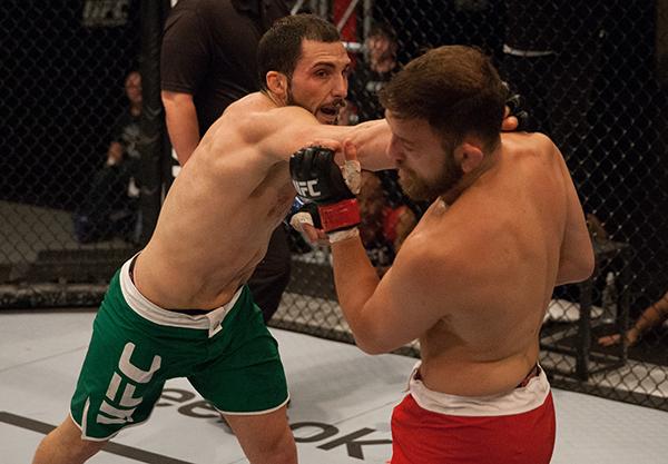 LAS VEGAS, NV - APRIL 3: (L-R) Enrique Marin punches Kevin Mendinilla during the filming of The Ultimate Fighter Latin America: Team Gastelum vs Team Escudero on April 3, 2015 in Las Vegas, Nevada. (Photo by Brandon Magnus/Zuffa LLC/Zuffa LLC via Getty