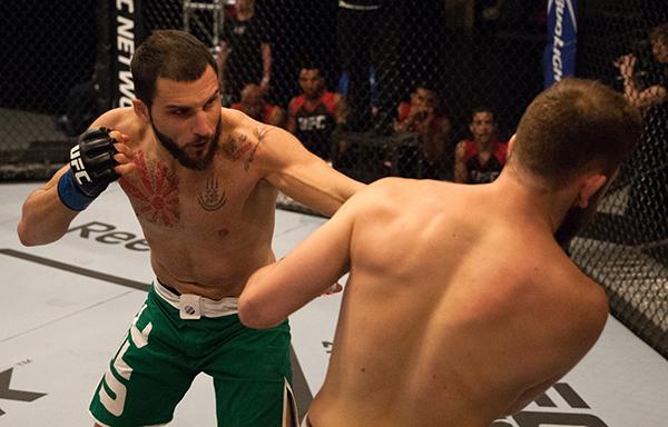 LAS VEGAS, NV - APRIL 3: (L-R) Enrique Marin punches Kevin Mendinilla during the filming of The Ultimate Fighter Latin America: Team Gastelum vs Team Escudero on April 3, 2015 in Las Vegas, Nevada. (Photo by Brandon Magnus/Zuffa LLC/Zuffa LLC via Getty